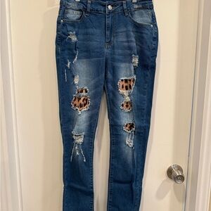 Women's Distressed Blue Jeans